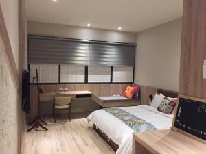 Voodi või voodid majutusasutuse Enjoy Homestay toas