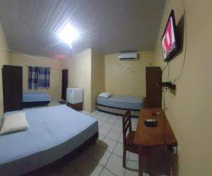 MK HOTEL Juruti TV 또는 엔터테인먼트 센터