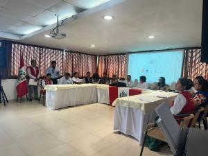 a group of people sitting at tables in a room at Doral Inn Hotel - Iquitos in Iquitos