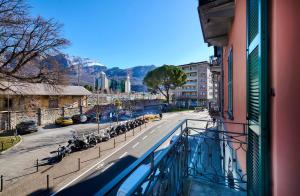 a view of a street from a balcony of a building at Monolocale 1 - via Sassi, Lecco in Lecco