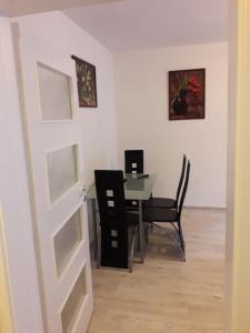 A television and/or entertainment centre at Sv & Angel Apartment