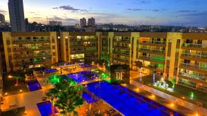 an overhead view of a large building with lights at Vg Fun by Diego Flats in Fortaleza