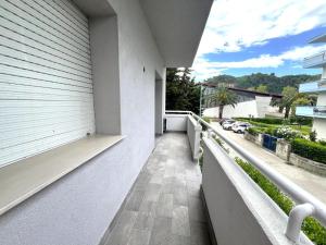 a balcony with a view of a street at Casa vacanza Emily in Pedaso