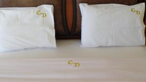 Postel nebo postele na pokoji v ubytování Cavo D' Oro