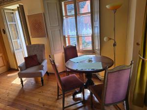 a dining room with a table and chairs at Garni Cà Stella in Bignasco +63 photos