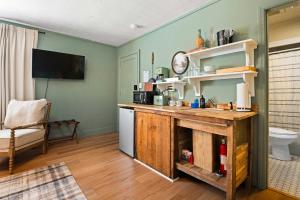 a kitchen with a wooden counter top in a room at LMI -15- Laurel Falls Room: Summers Night in Lookout Mountain