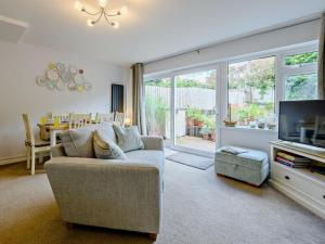 a living room with a couch and a tv at 3 Bed in Brixham oc-92770 in Brixham