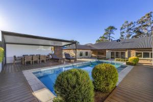 a swimming pool in the backyard of a house at Route 86 Bright in Bright