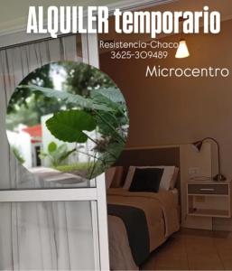 a poster of a bedroom with a bed and a table at El DESCANSO HOSPEDAJE in Resistencia