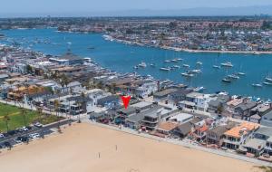 an aerial view of a harbor with boats in the water at 1005 East Balboa in Newport Beach