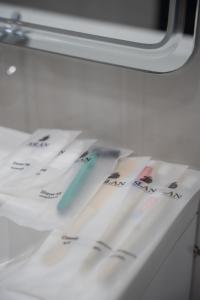 a counter with papers on it on an airplane at Aslan Boutique Apartments in Patong Beach +29 photos
