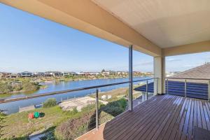 a balcony with a view of a river at 41 Blanche Pde, Hindmarsh Island in Hindmarsh Island