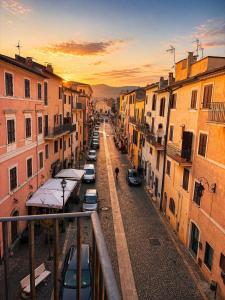 a view of a city street with cars and buildings at Sole Suite & Boutique Rooms in Norma