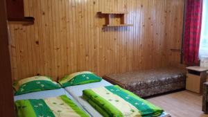 Posteľ alebo postele v izbe v ubytovaní Pokoje Zakopane