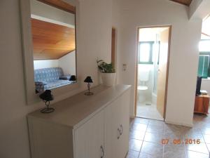Koupelna v ubytování Apartments Suljic - Cash Only Property
