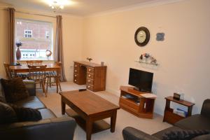 A television and/or entertainment center at Red Leaf Apartments 