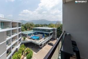 an aerial view of a building with a swimming pool at The Regent Phuket Bangtao Beach in Bang Tao Beach
