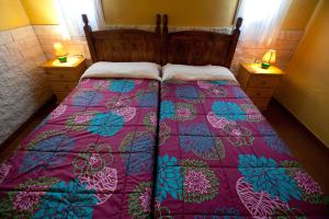 Ένα ή περισσότερα κρεβάτια σε δωμάτιο στο Alojamientos El Tejado +38 φωτογραφίες