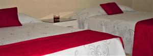 Postel nebo postele na pokoji v ubytování Apart Hotel Express