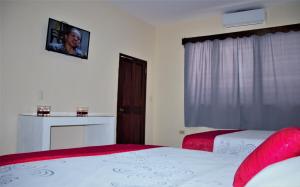 Postel nebo postele na pokoji v ubytování Apart Hotel Express