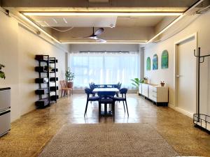 a dining room with a table and some chairs at SiSu2 in Chilgok +35 photos