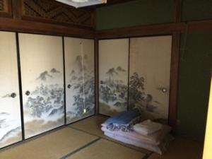 a room with a painting on the wall at Strawberry villa in Ichihara