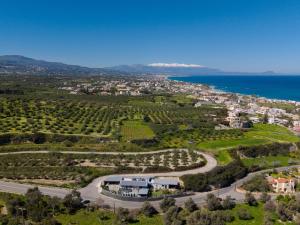 an aerial view of a town with the ocean at Solena Villa in Stavromenos