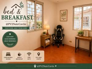 a room with a chair and a desk and window at Bed and Breakfast at PV2NaicCavite in Naic