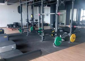 a gym with a bunch of equipment in it at D'Sunset Guesthouse TIMURBAY SEAFRONT -KUANTAN in Kuantan