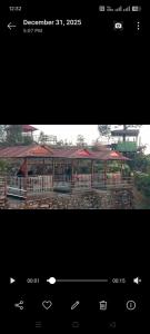 a picture of a park with a pavilion at DEVITHAN Resort in Dharān Bāzār
