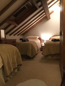 Voodi või voodid majutusasutuse Skip To The Zipwire toas