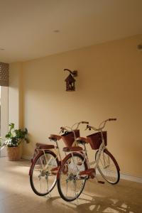 two bikes parked next to each other in a room at Lam Home Tuần Châu in Ha Long