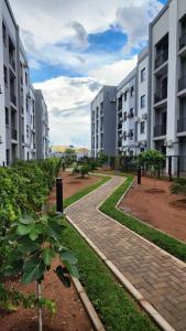 a walkway between two apartment buildings at Minnestayairbnb in Gaborone