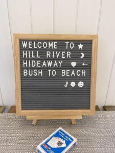 a sign that says welcome to hill river hideawaybush to beach at Hill River Nature Reserve by Tiny Away in Jurien Bay +37 photos