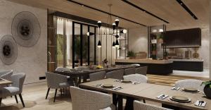 a dining room with tables and chairs and a kitchen at Kampala Marriott Hotel in Kampala