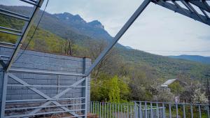a room with a view of a mountain at Chechakar Boutique Hotel in Ditavan