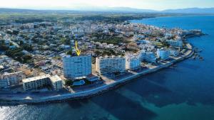 an aerial view of a city next to the water at MARSOL in L'Escala