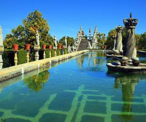 a large pool of water in a park at Casa da Olívia in Castelo Branco