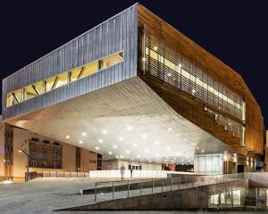 a large building at night with lights on it at Casa da Olívia in Castelo Branco