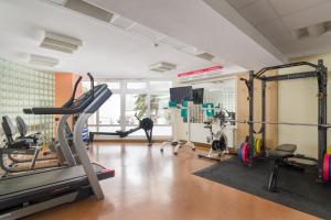a gym with tread machines and a treadmill at San Medical Spa in Kołobrzeg