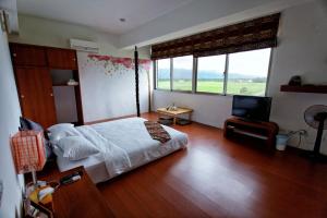TV a/nebo společenská místnost v ubytování Maple Feeling Vacation Farm