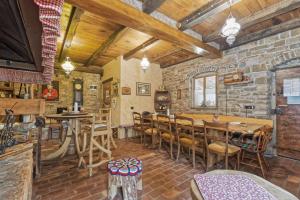 a dining room with a table and chairs at Casa Mira by Rent Istria in Pazin +27 photos