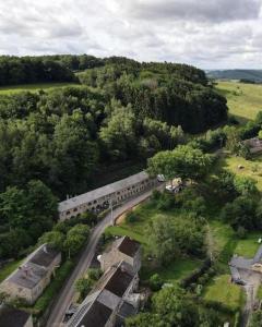 an aerial view of a train station in a village at lignely in Durbuy