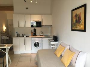 A cozinha ou cozinha compacta de Residence Gameau