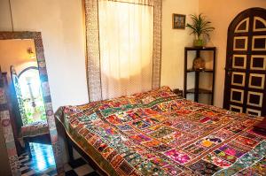 Ein Bett oder Betten in einem Zimmer der Unterkunft "Sunny Cow" Village Villa