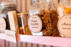 a jar filled with some cookies in a display at Nice Centre Hotel in Nice