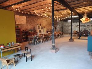 a large room with tables and chairs in it at Le Studio 3 - Route des vins in Rorschwihr +19 photos