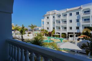 a view from the balcony of a hotel at ENDLSS BEACH & DISCO HOTEL IBIZA Adults Only in San Antonio Bay
