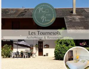 a sign for a restaurant with a bed and a table at La Ferme du Croît - Proche Lacs & Observatoires in Villehardouin