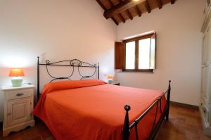 Postelja oz. postelje v sobi nastanitve Agriturismo Parco di Canuleio